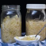 Finished sauerkraut in jars and bowl
