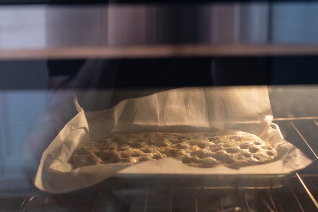 focaccia being baked in oven