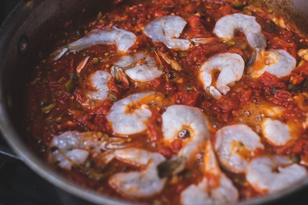 poaching shrimp in tomato sauce