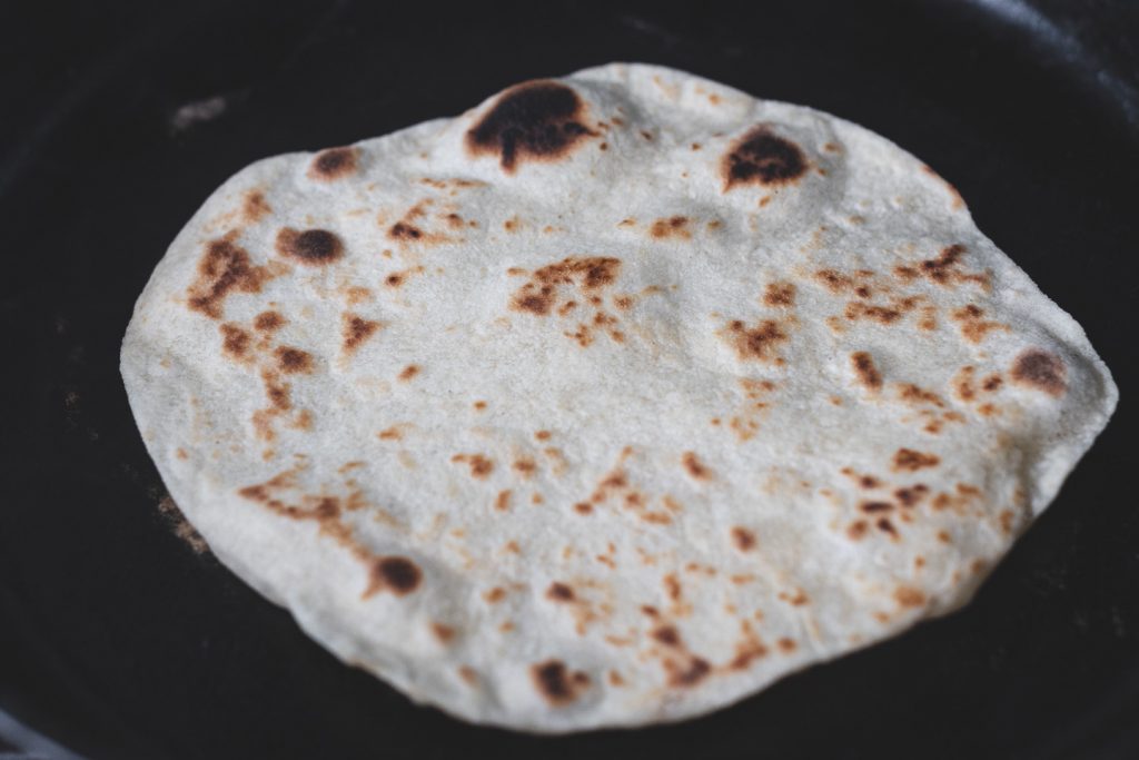 tortilla flipped over showing nice toasting