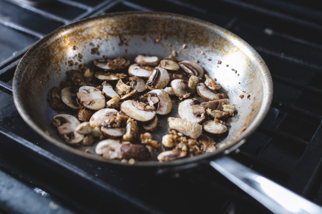 mushrooms added to shallot and garlic-[Copyright David Lewetag II]